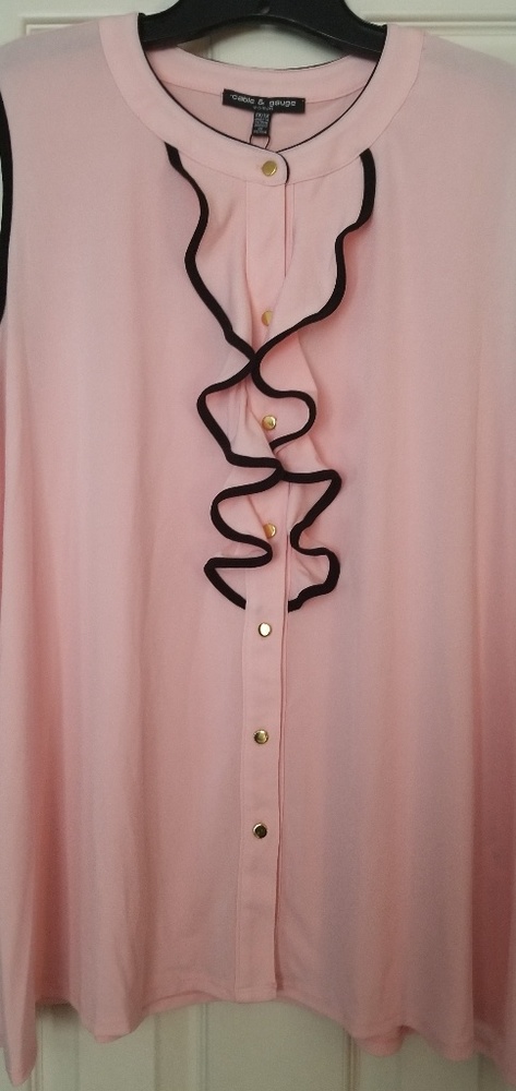 Pink and black ruffle sleeveless blouse.